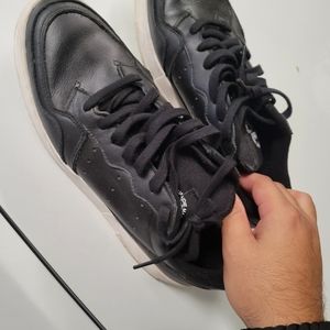 Clean pair of adidas leather shoes 10.5